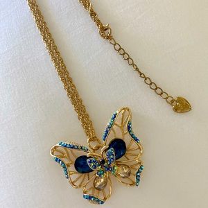 Gold-toned Butterfly pendant/Chain-24inch